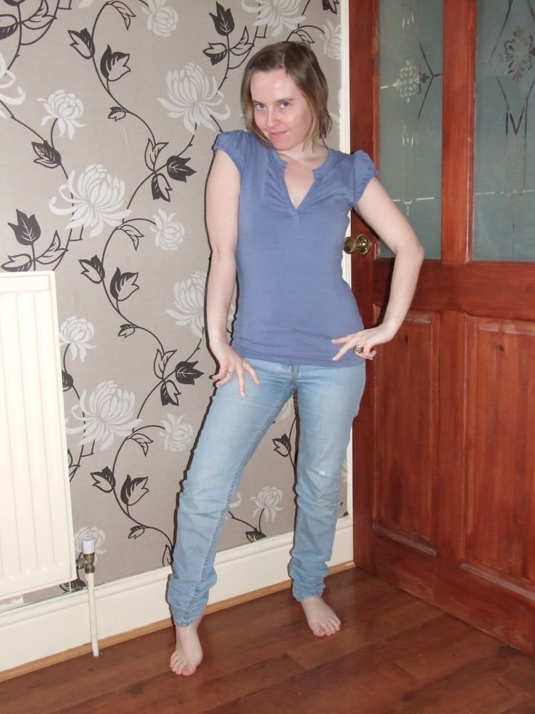 cute blonde posing in jeans and shirt  #2