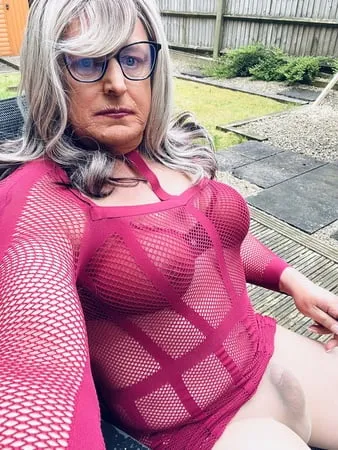 amateur crossdresser kelly cd in pink fishnet dress         