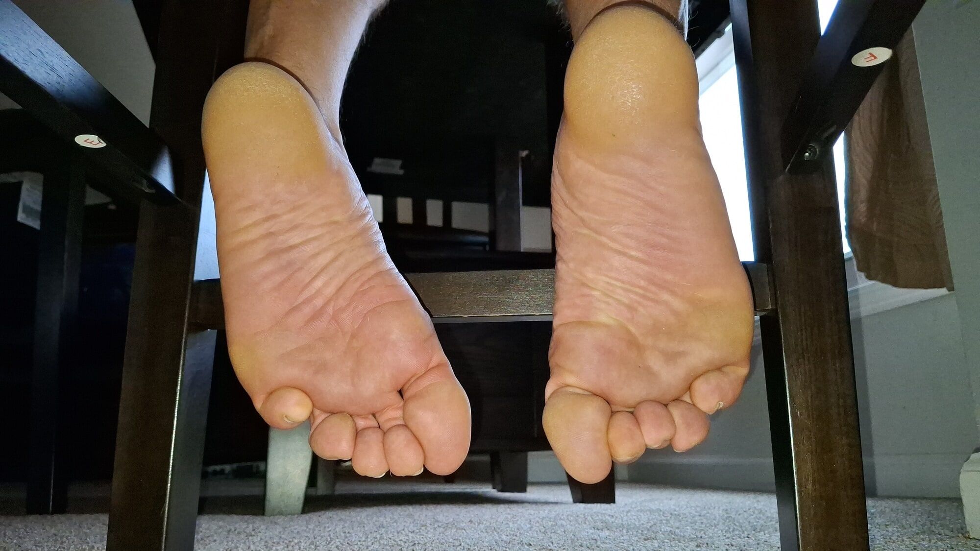  feet under the chair #15