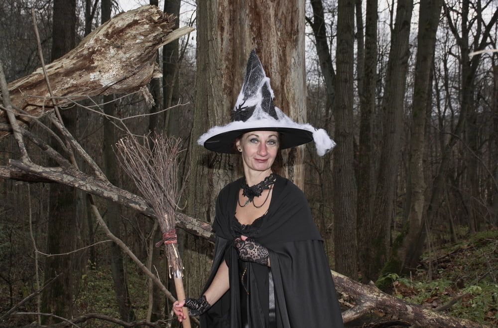 Witch with broom in forest #36