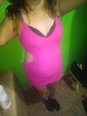 pack    she tries on a short pink dress         