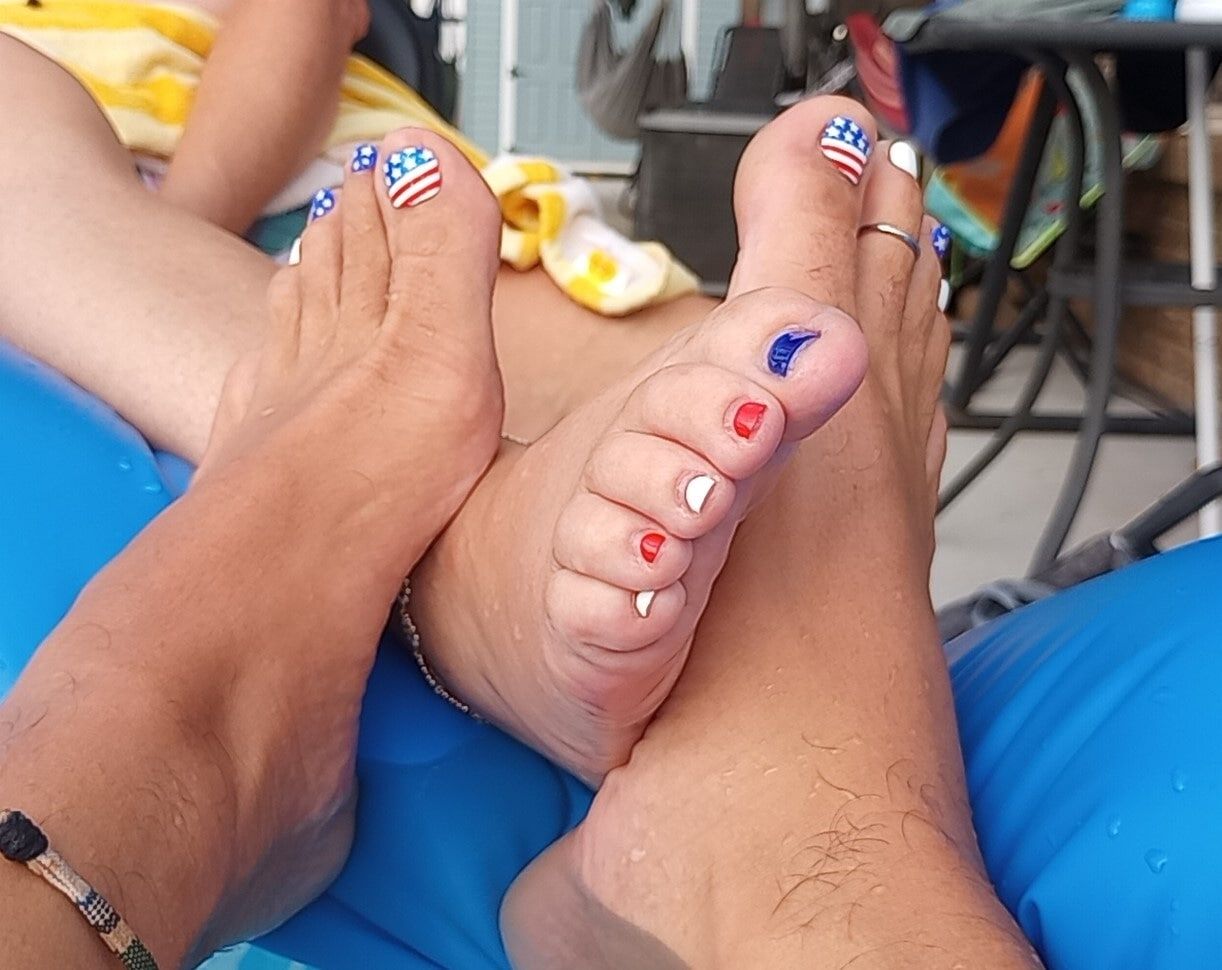 Showing off our wet  pedicured toes 