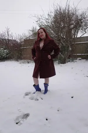 pregnant flashing naked in the cold snow         