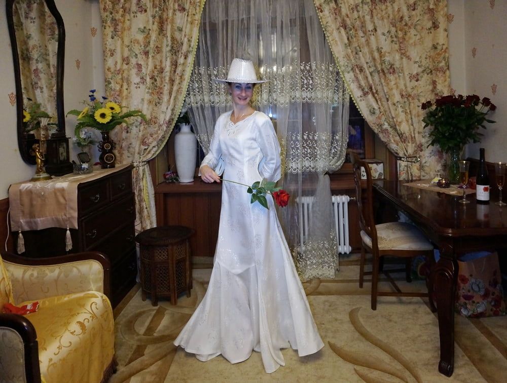 In Wedding Dress and White Hat #16