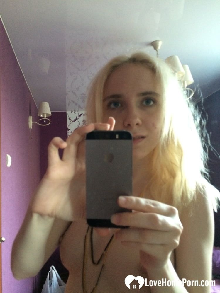 Skinny blonde cutie taking a couple of selfies #10