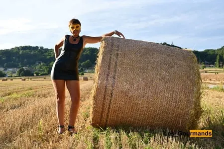 milf in wetlook in hay bales         