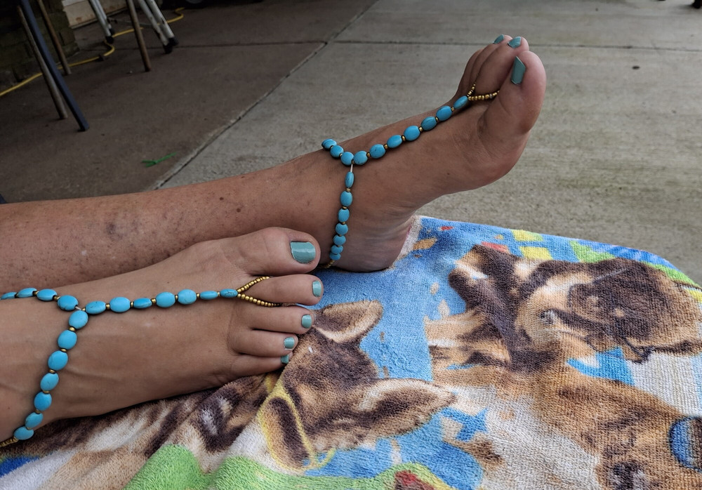 Barefoot sandals on cute pedicured toes #12