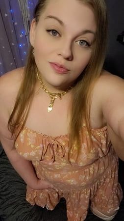 Cute bbw in dress and white fishnet knee highs