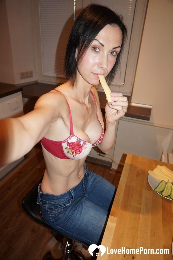 Skinny MILF shows off her fake tits #10
