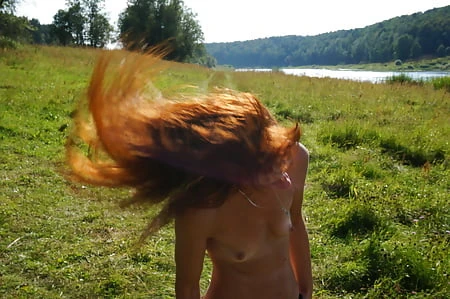 redhair on volga river beach         