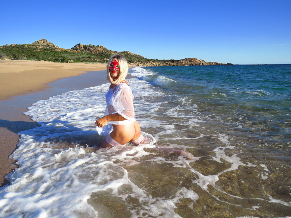 Sexy MILF Blonde shows off her ass on the beach. #19