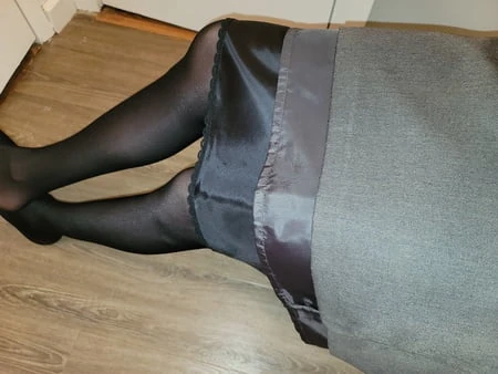 grey pencil skirt with black silky half slip         