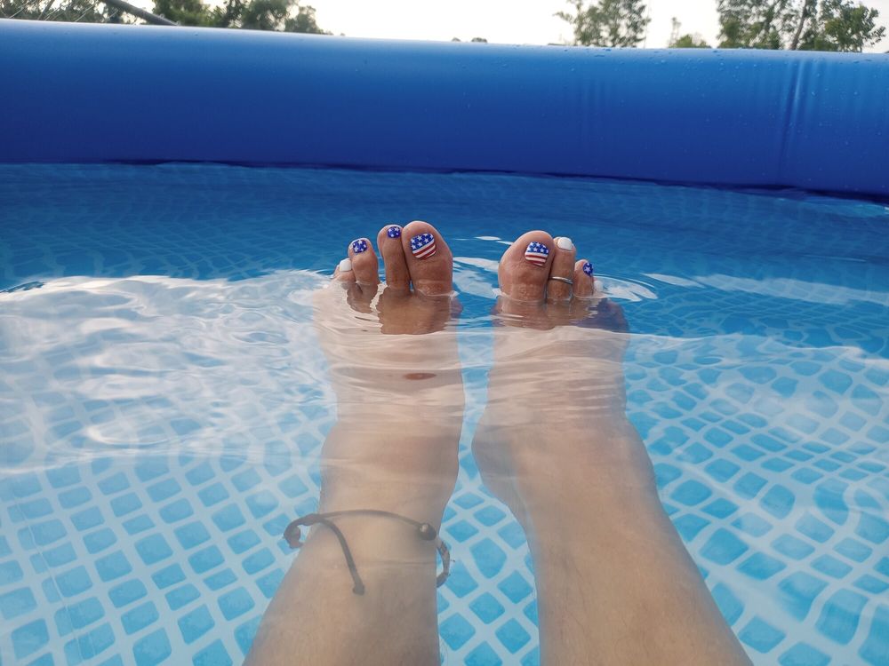 Showing off our wet  pedicured toes  #9