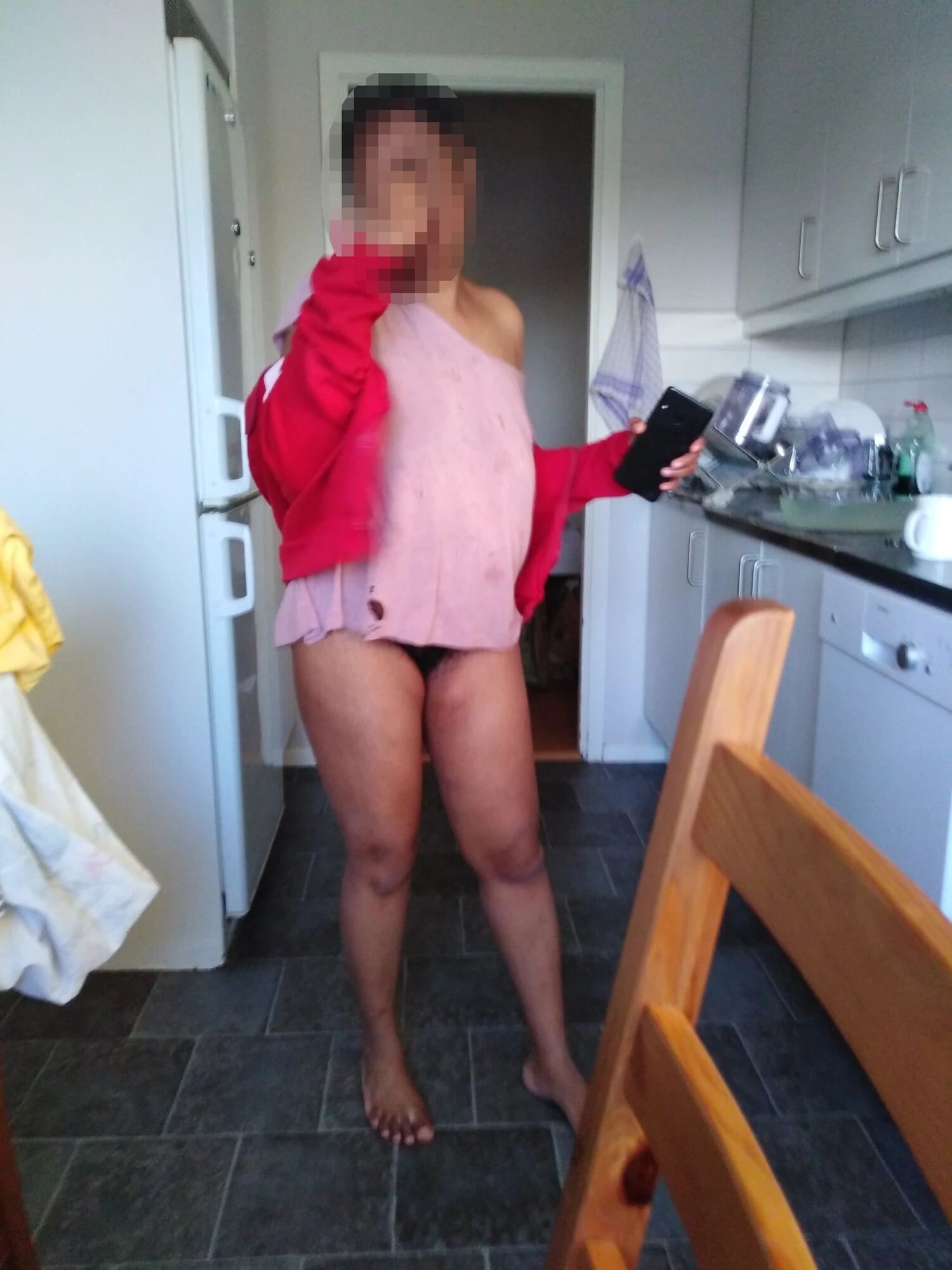 Nude in the kitchen