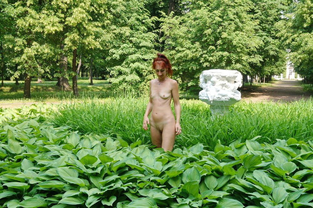 Naked in the grass by the vase #5