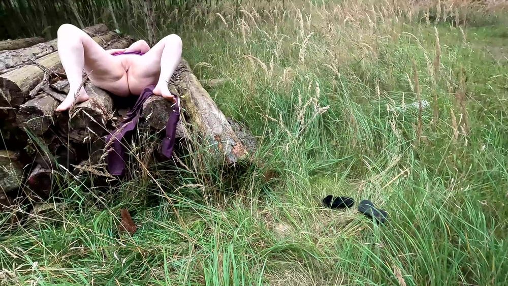 Whipping her naked cunt on hiking way #15