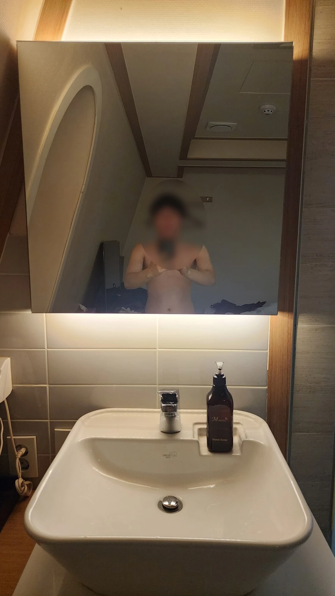 In front of the sink