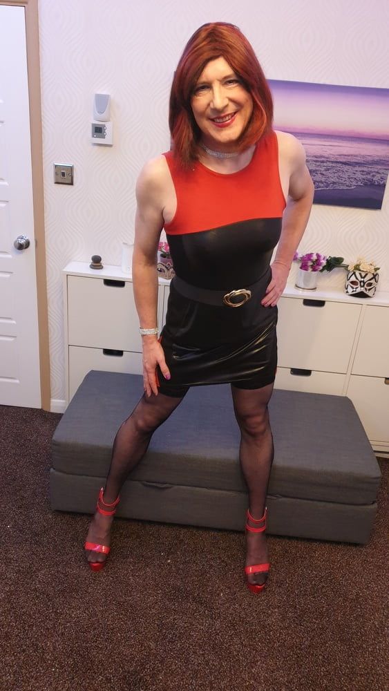 TGirl Lucy posing and playing in black and red bodycon dress #6
