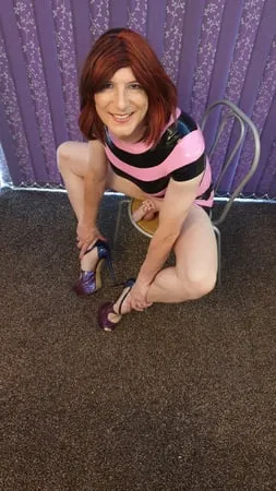 sissy lucy in latex and chastity cage         