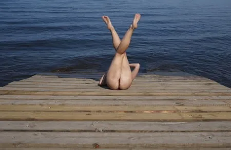 legs play on a wooden platform         