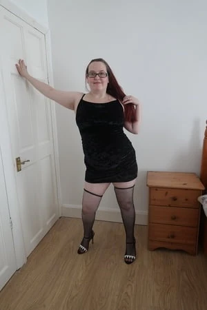 date night black velvet dress fishnet stockings         