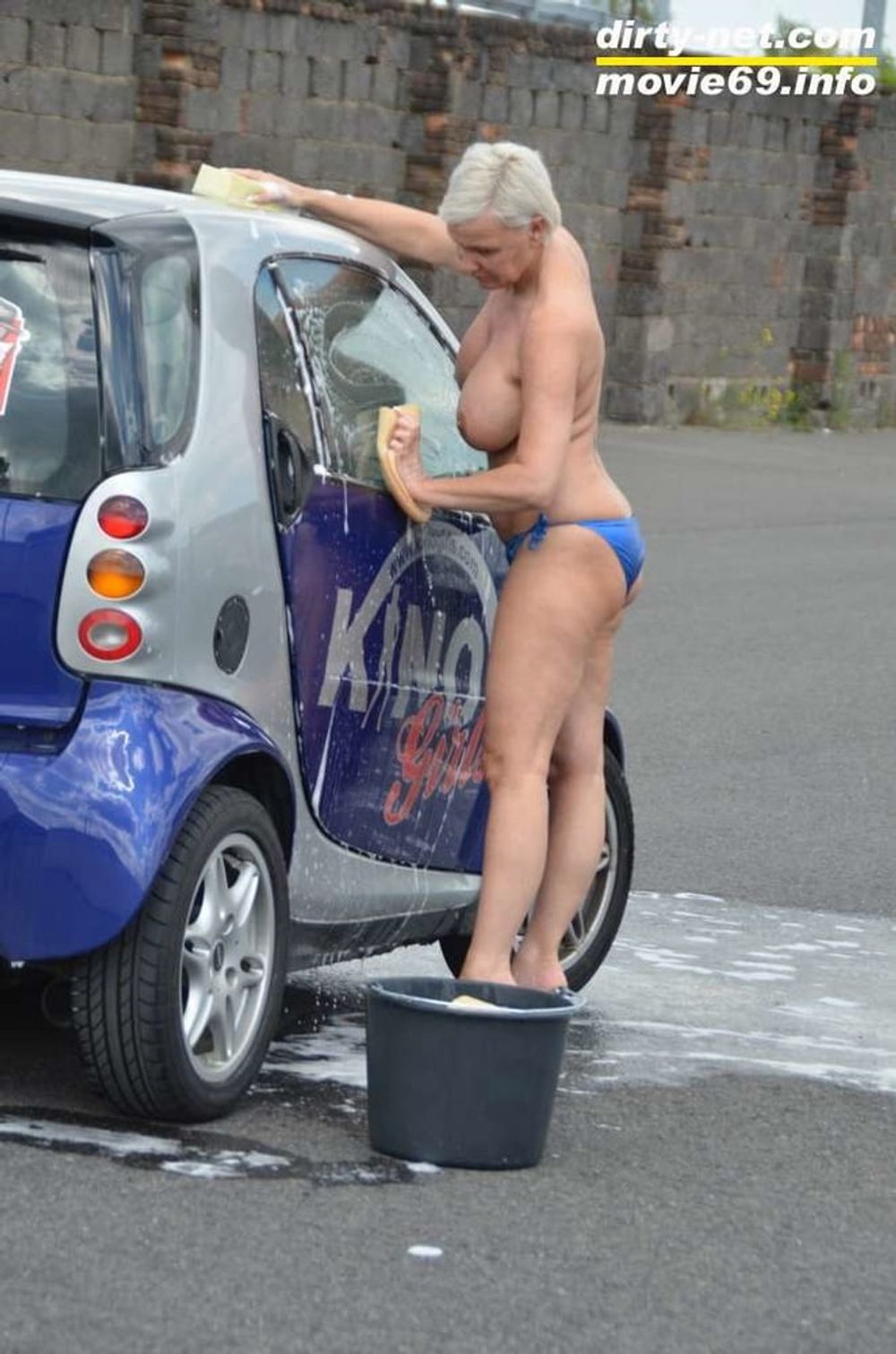 Jill Summer at the carwash in a bikini and topless #26