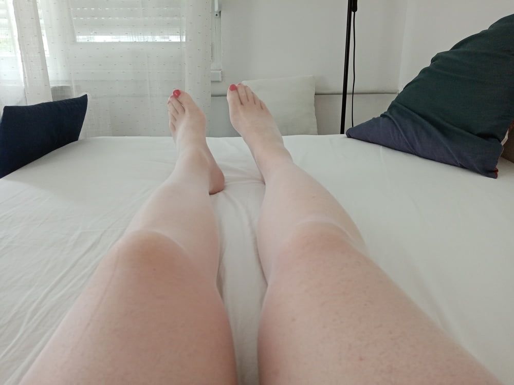 White free-standing white pantyhose on and without red heels