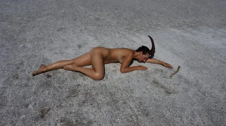 lying naked on the salt of the saltlake elton russia         