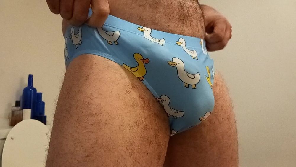 Small penis bulge cum in cute duck speedo, brief, trunks. #15