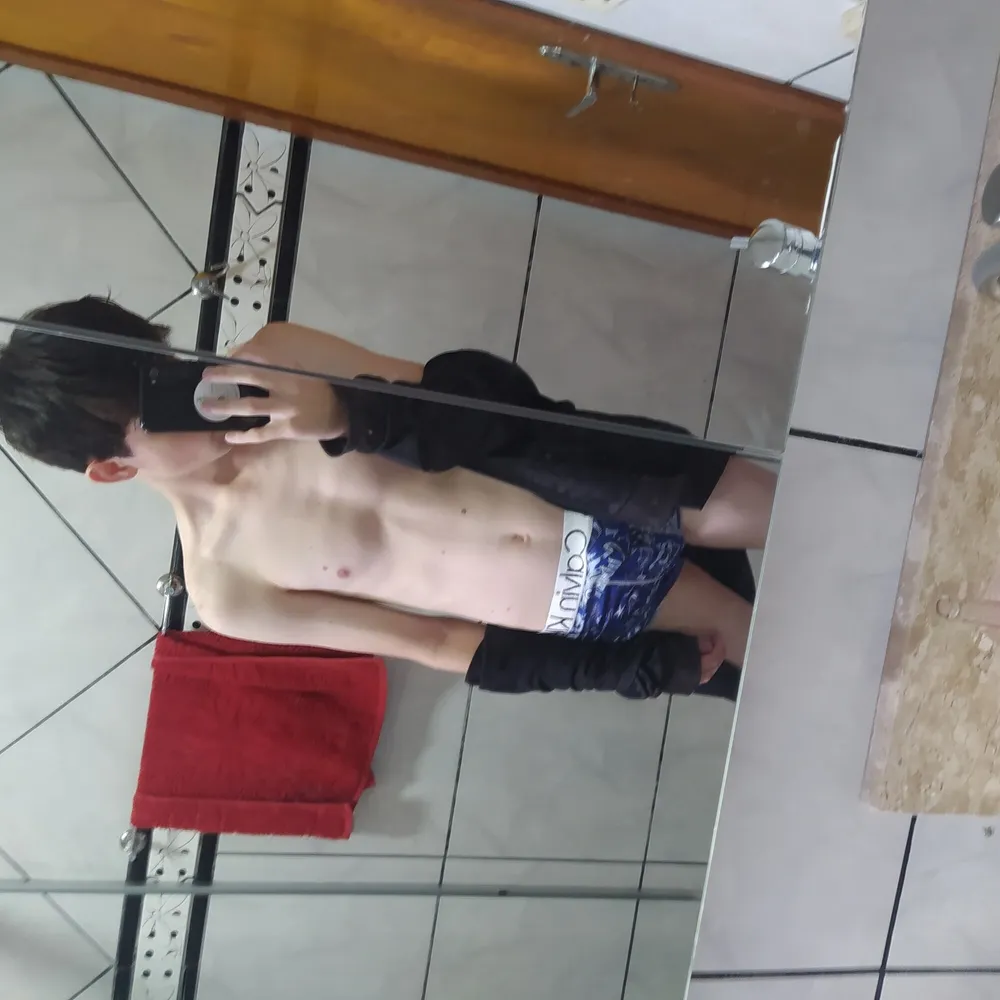 Boy showing off in the mirror #10