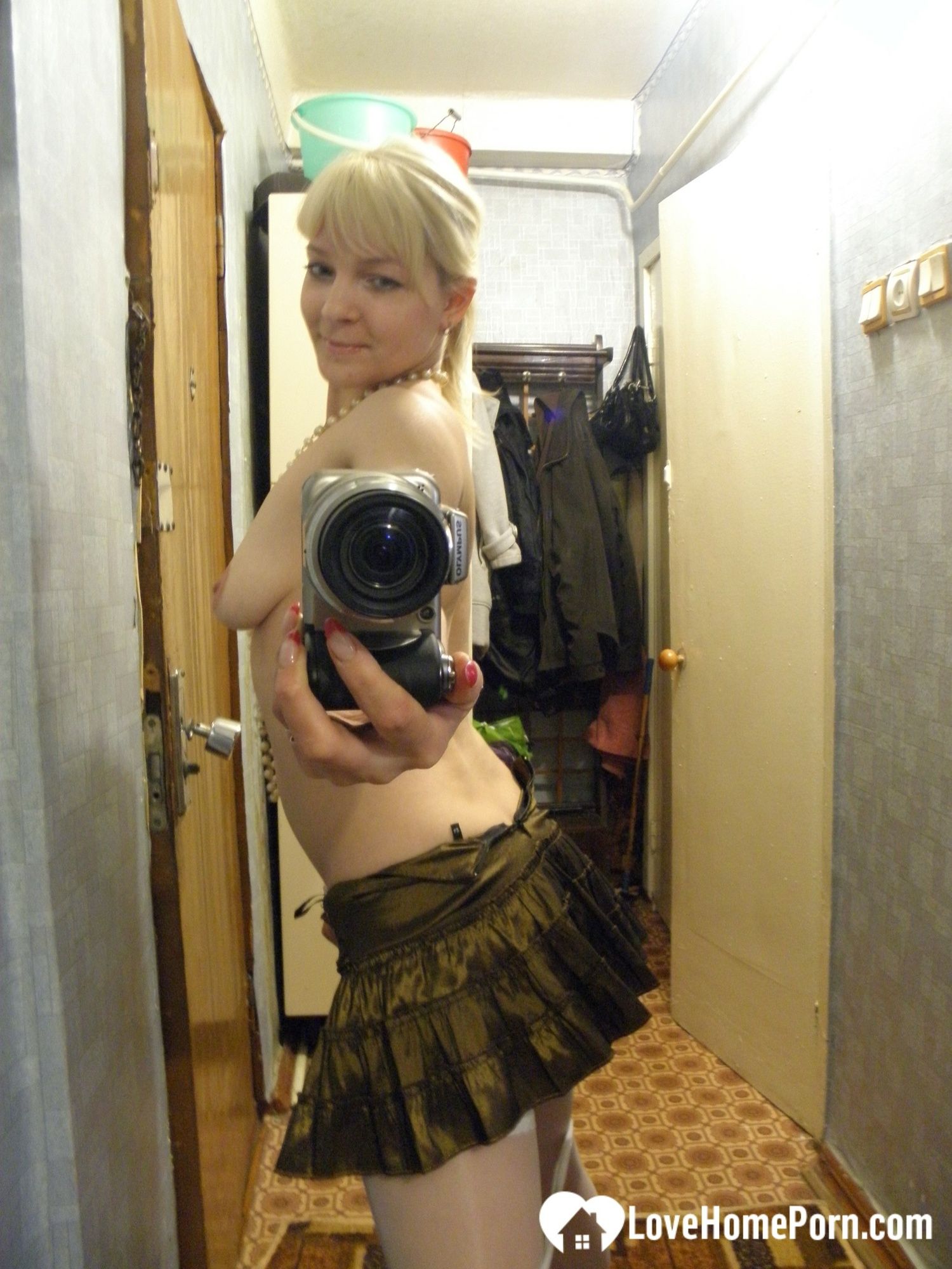 Aroused blonde in stockings taking naughty selfies #24