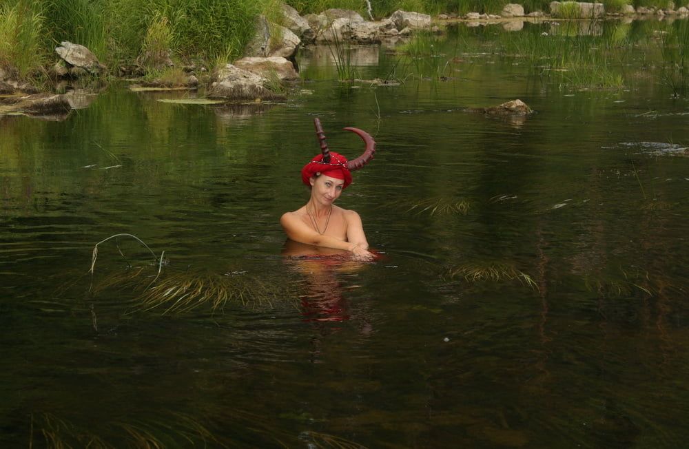 With Horns In Red Dress In Shallow River #28