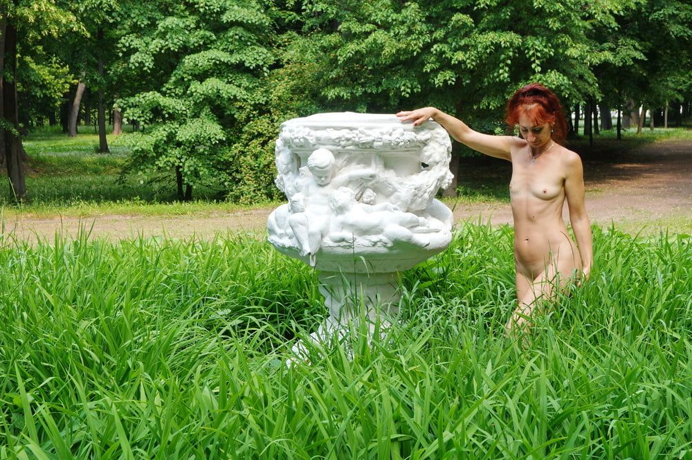 Naked in the grass by the vase #31