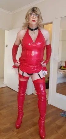 rachel wears red pvc dress         