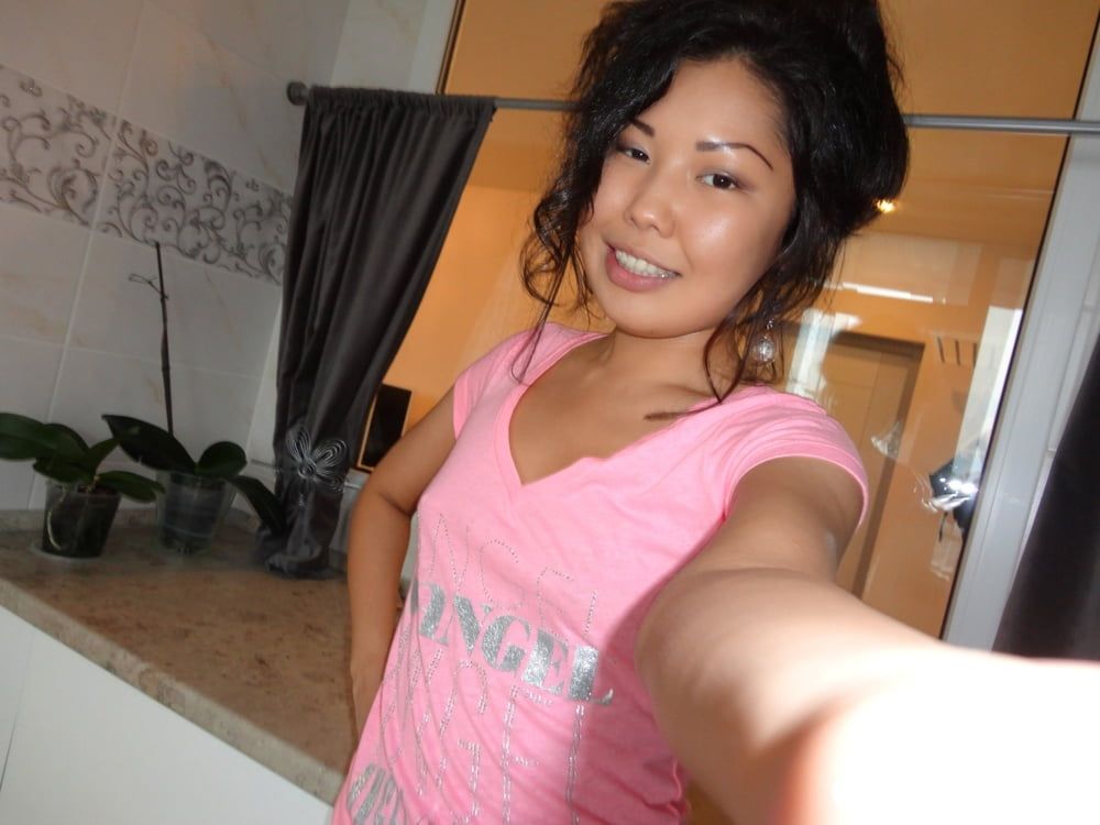 Naughty Asian teasing all around her apartment #16