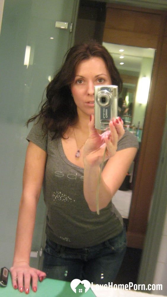 Innocent brunette teasing in her own bathroom #2