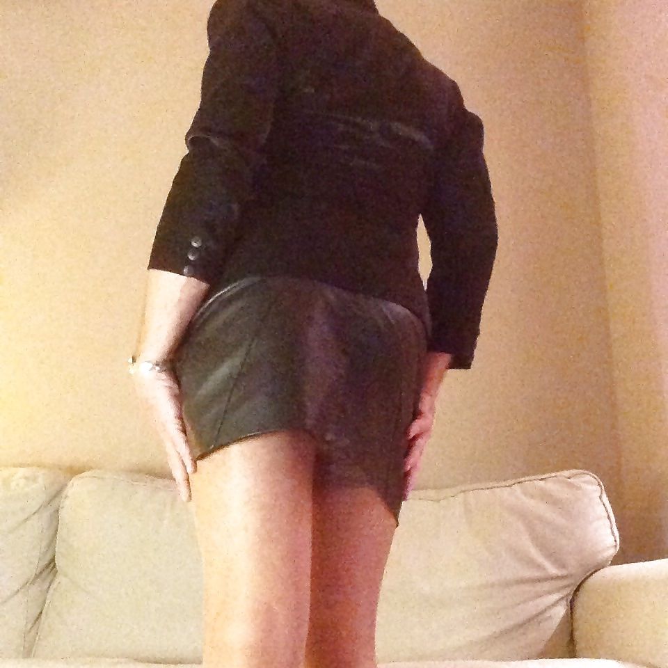 Kinky in leather skirt, stockings, satin lingerie #2