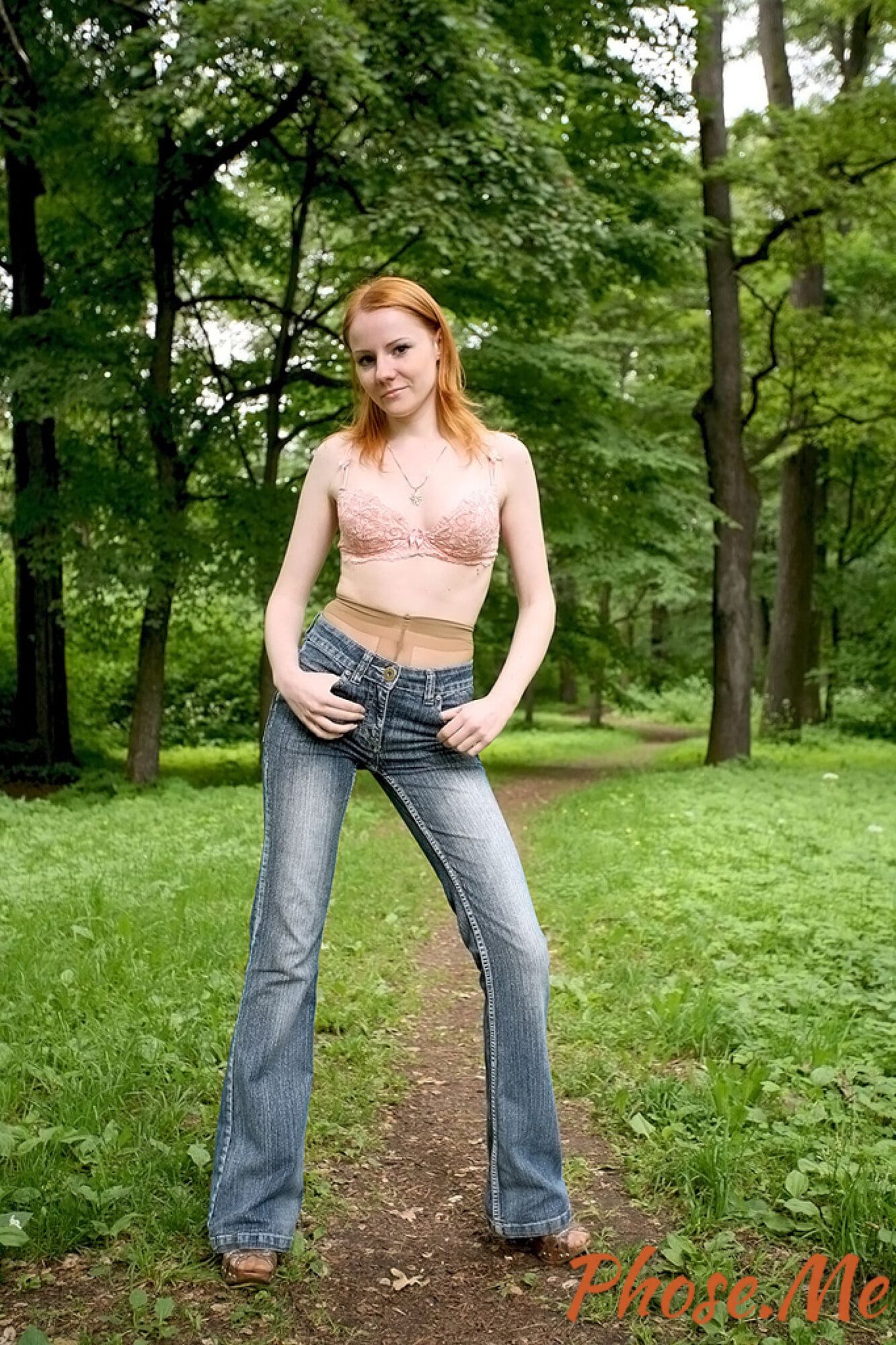 Sexy Redhead Strips Out Of jeans In Forest