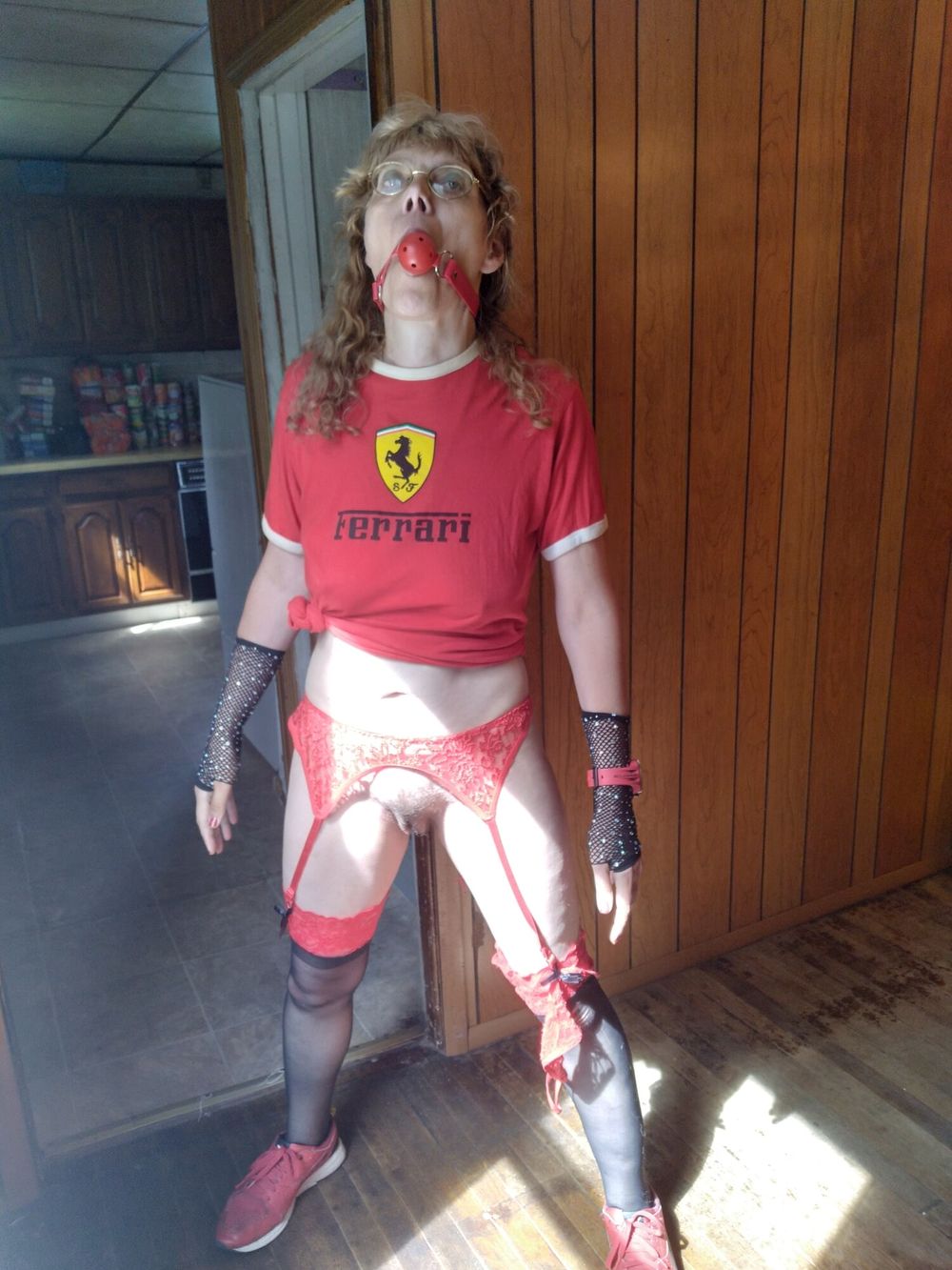 Red and black garters Ferrari outfit on breakfast table