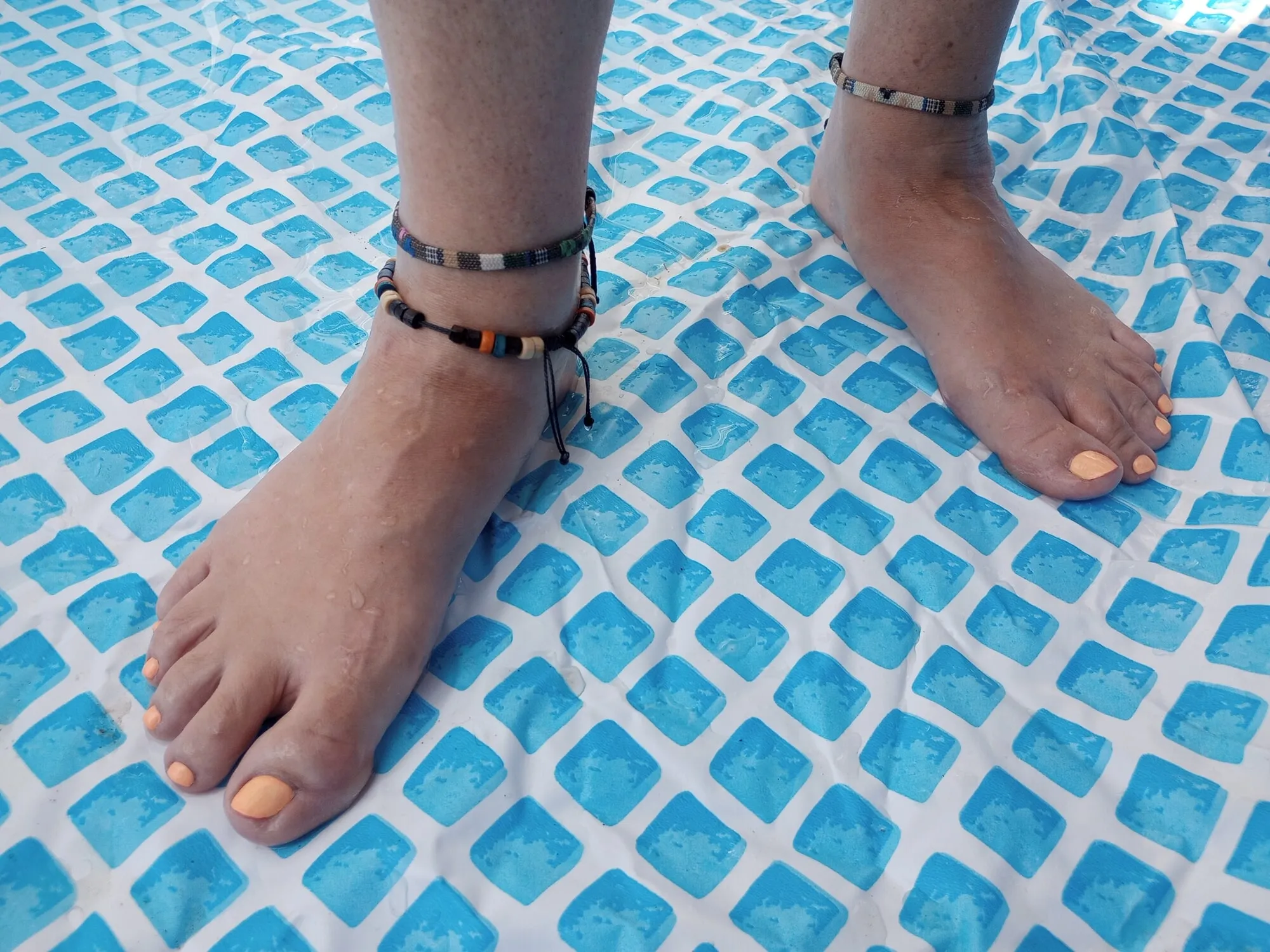 Girlfriends Feet in the pool