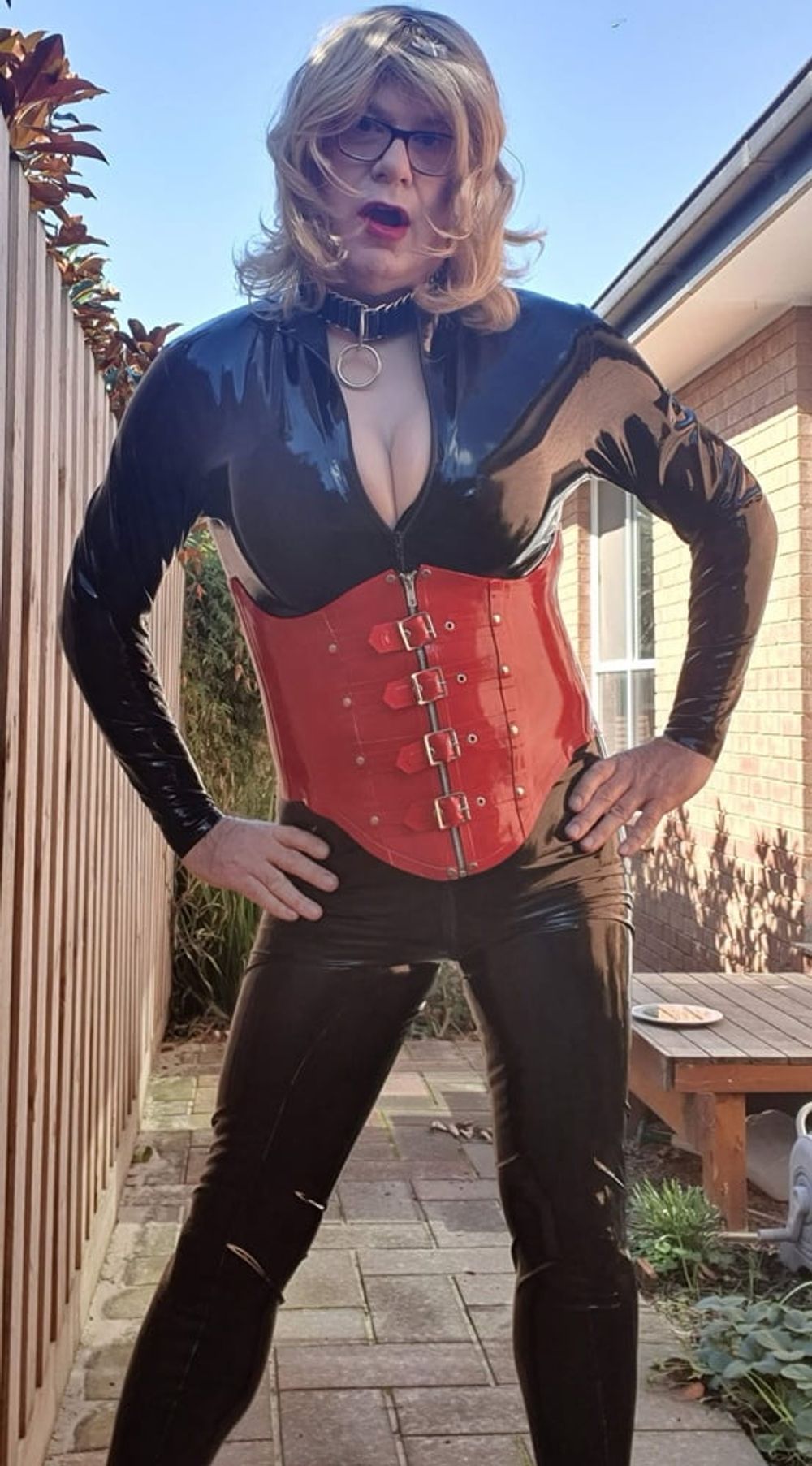 Rachel Wears a Catsuit and a Red Corset #7