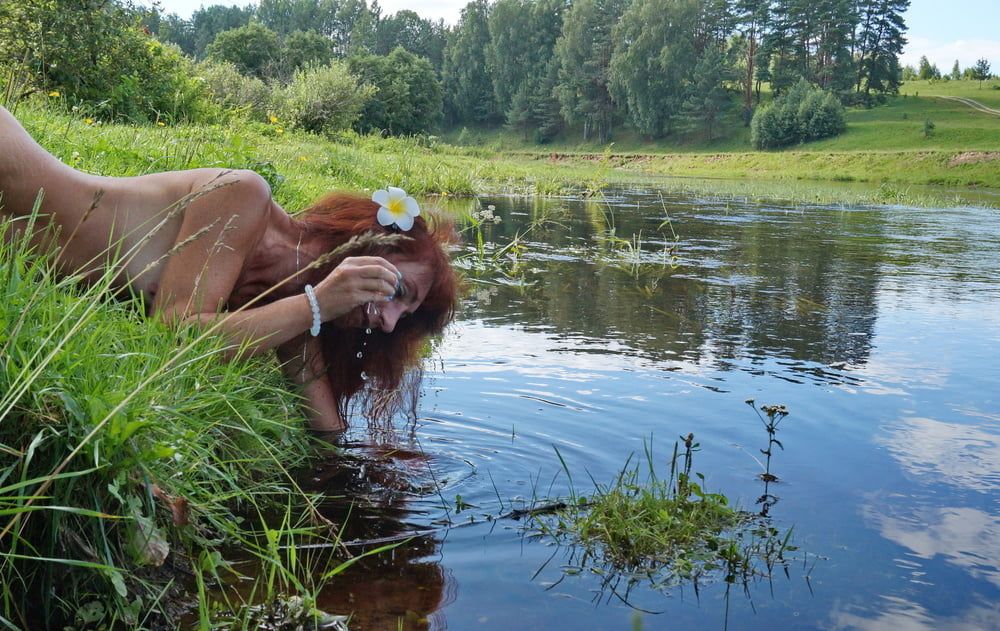 Mermaid plays with water #10