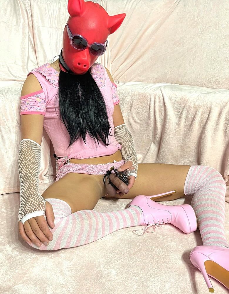 Sissy Wearing A Pink Dress, Heels And Chastity Cage (Pt. 2)
