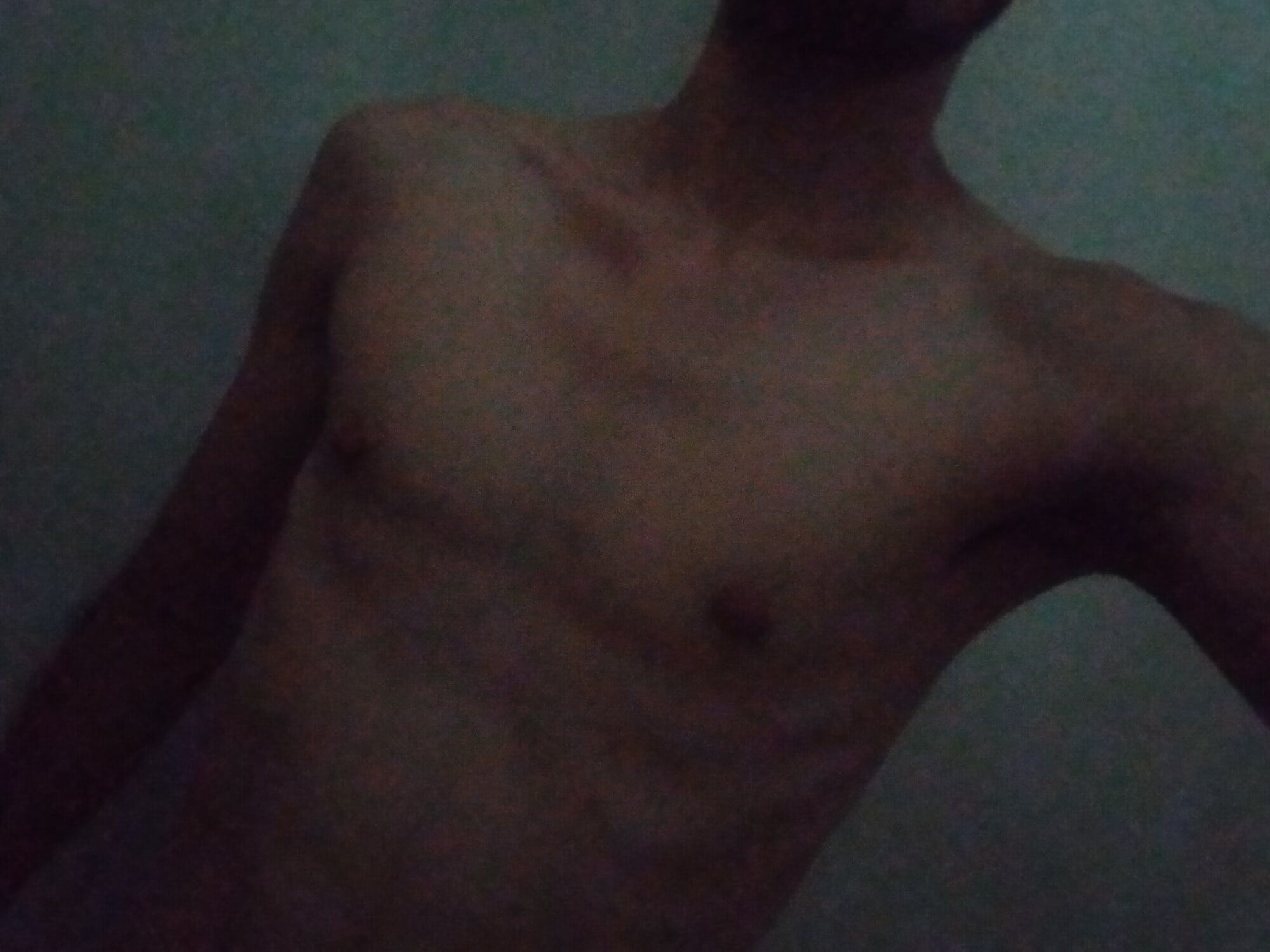 skinny guy takes photo in his shower #2