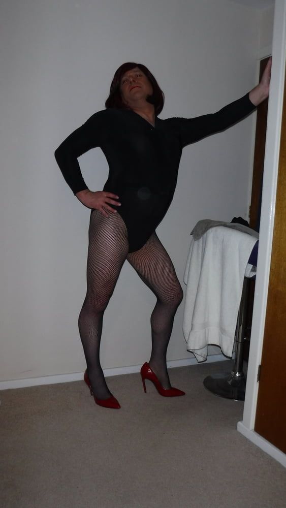 SISSY ROSIE IN FISHNET, RED HEELS AND BODYSUIT #17