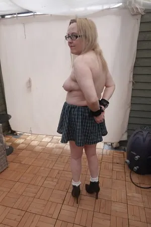 shy schoolgirl stripped to skirt and heels cuffed         