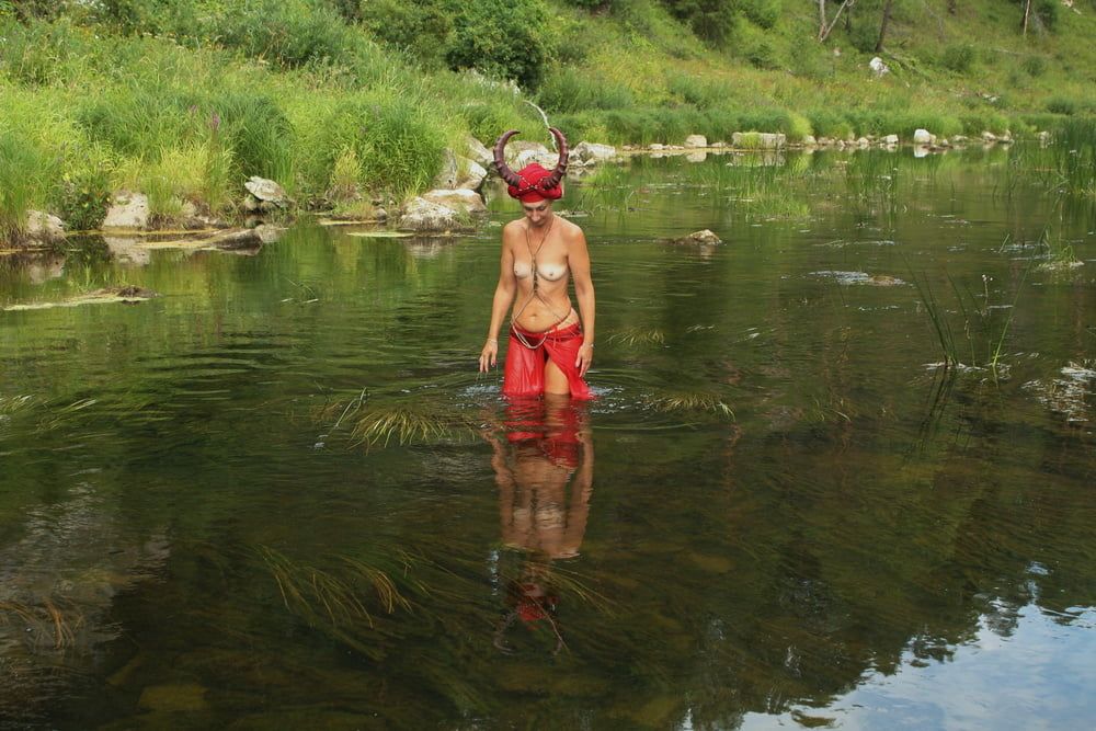 With Horns In Red Dress In Shallow River #58