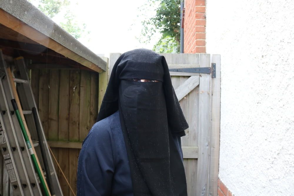 Burqa Outdoors Flashing in the Rain #46
