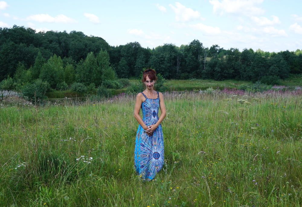 In blue dress in field #46