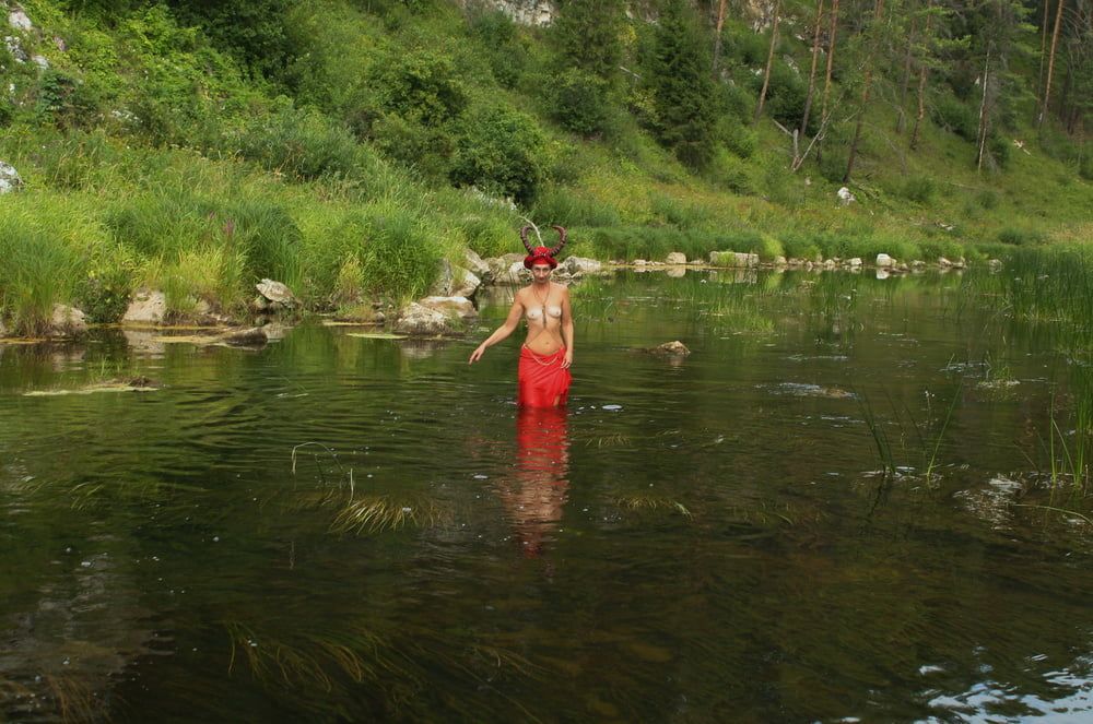 With Horns In Red Dress In Shallow River #13